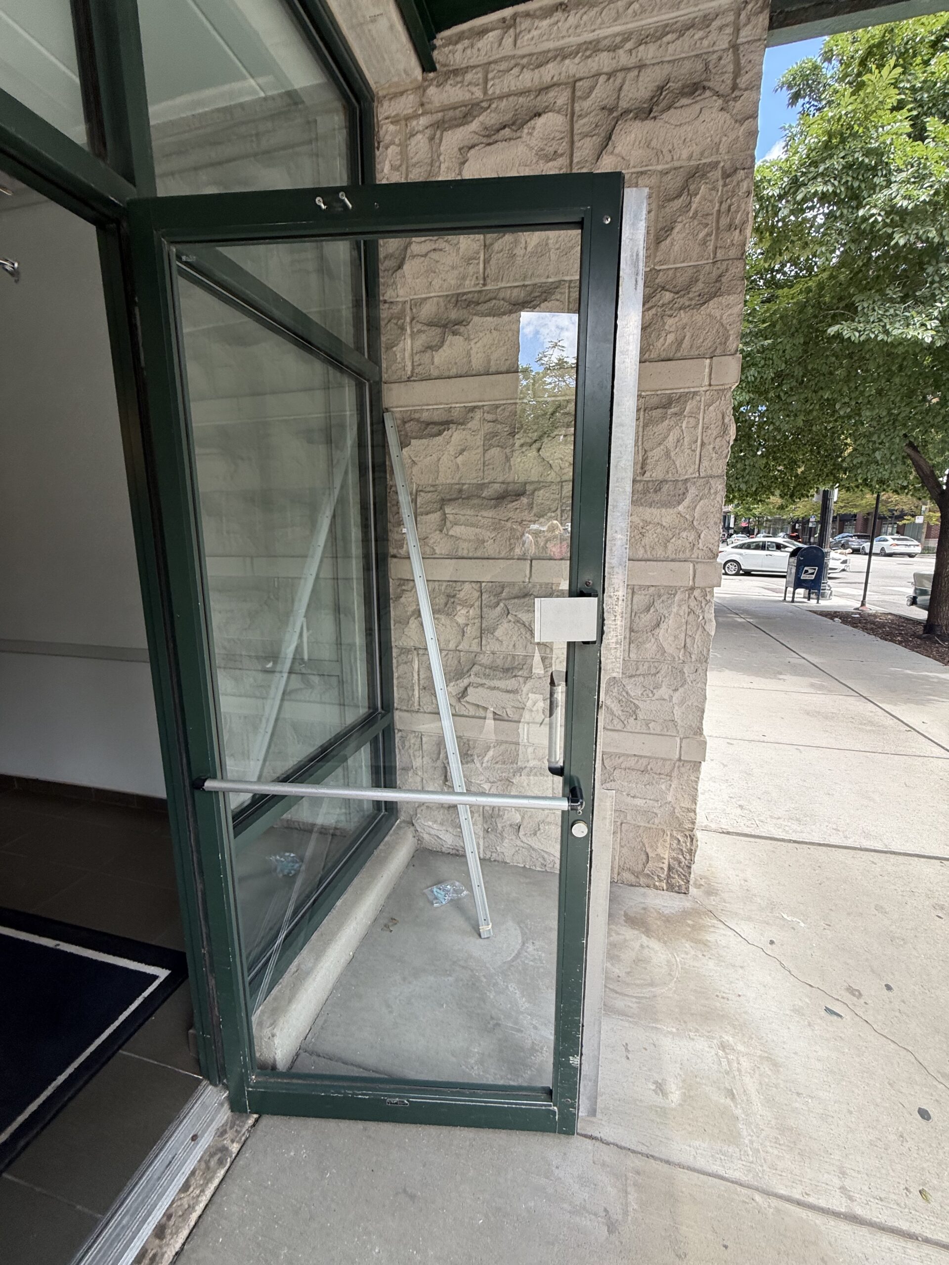 Commercial locksmith servicing business entry door in Chicago Illinois