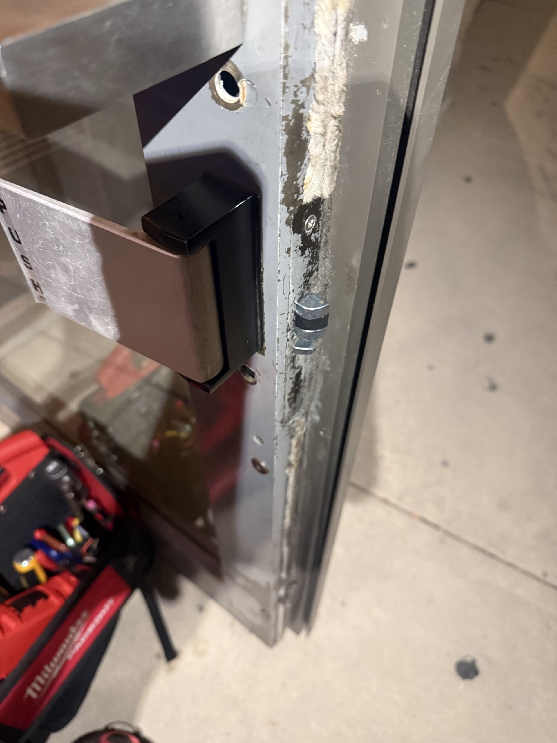 Emergency locksmith technician completing lock and door service in Cicero Illinois