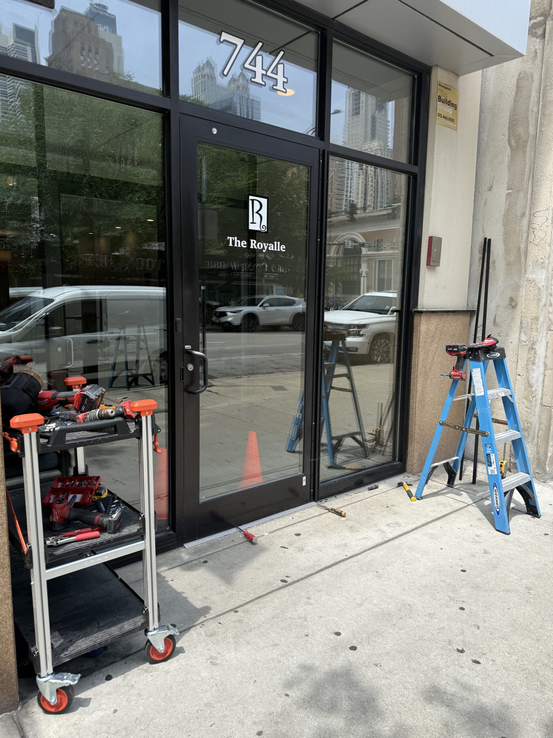 Full length continuous hinge replacement on aluminum commercial door in Pilsen Chicago